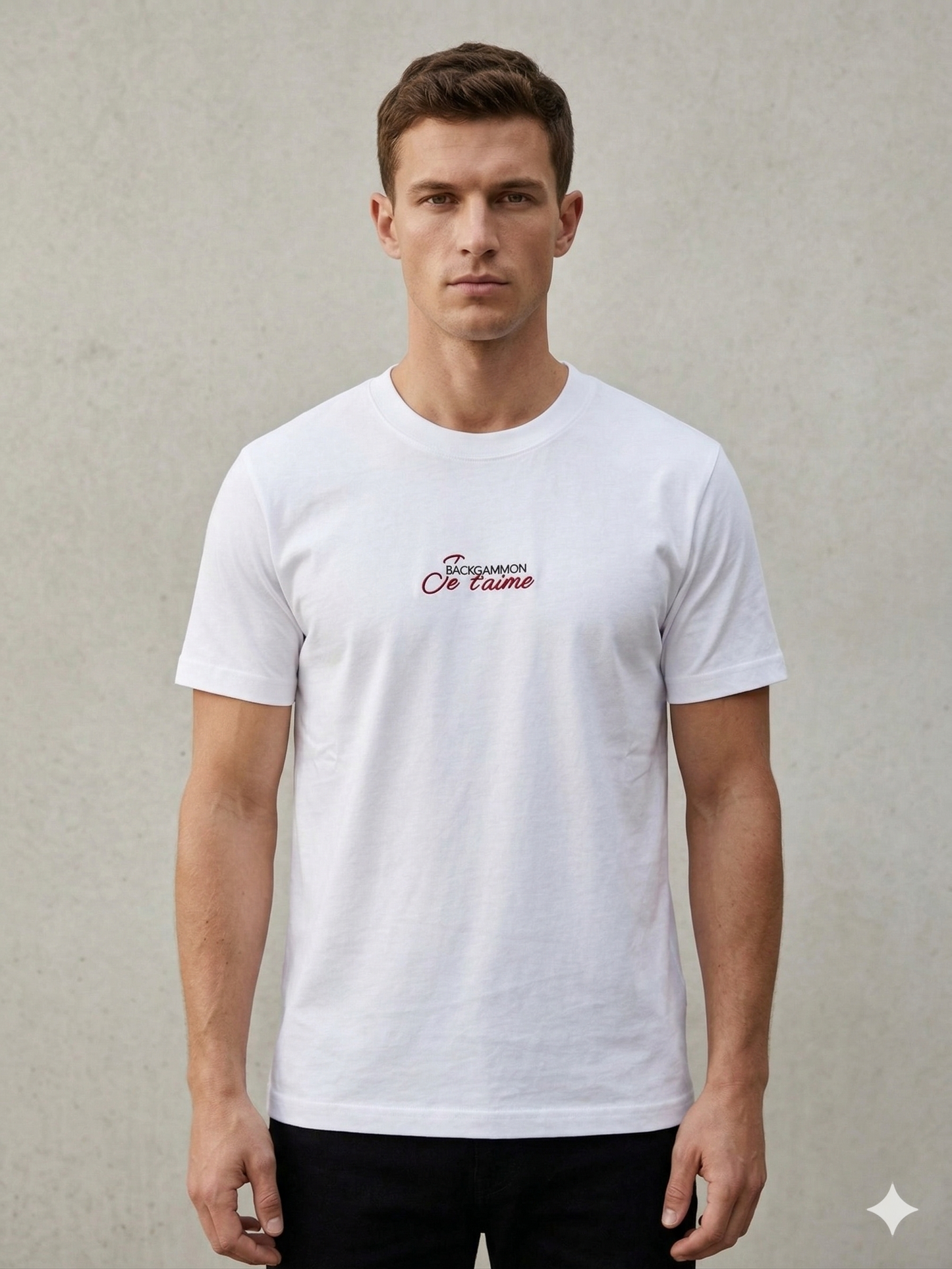 Model wearing the white Backgammon Je t'aime T-shirt with embroidered red script logo on the chest