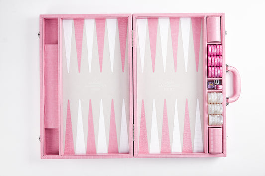 Straight-on view of open Miami Pink crocodile-embossed backgammon case standing upright with pink and white checkers in the side tray