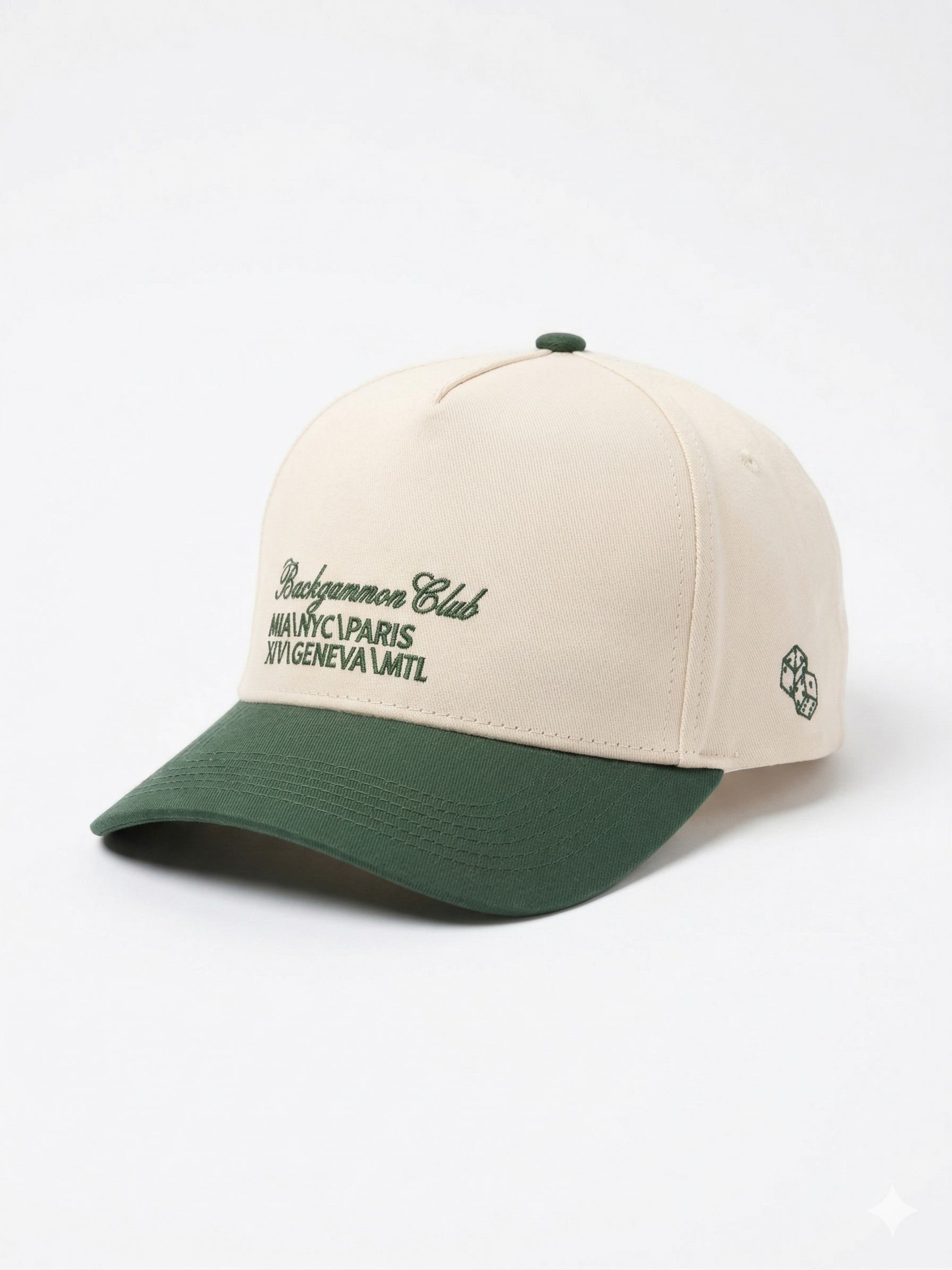 Side view of the Backgammon Club Signature Trucker Hat with cream crown, forest green brim, and embroidered Backgammon Club script with city list