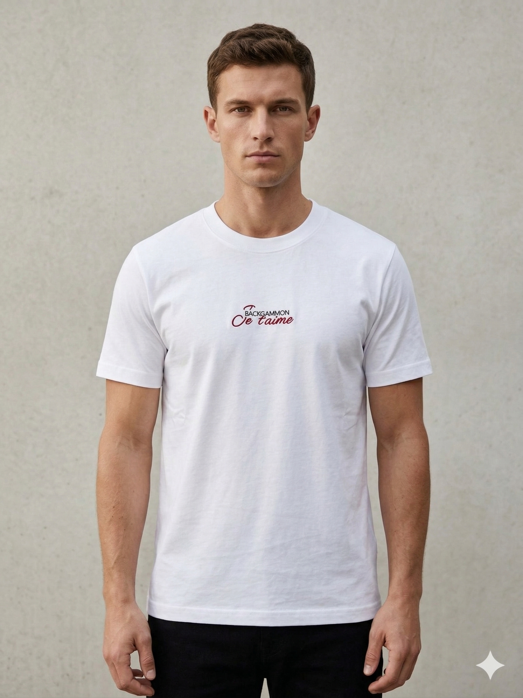 Model wearing the white Backgammon Je t'aime T-shirt with embroidered red script logo on the chest