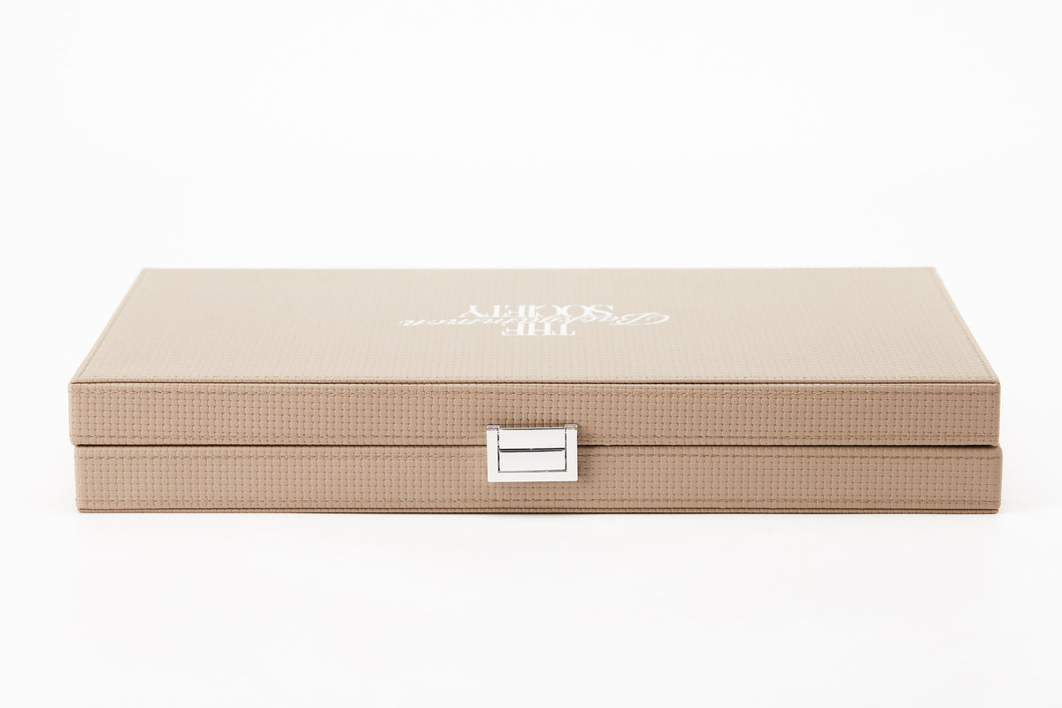 The Backgammon Society Board in sand woven-textured leather, closed, front view