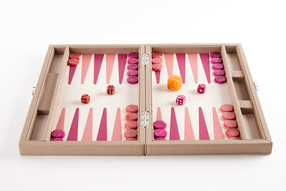Beige backgammon board open flat, seen from above