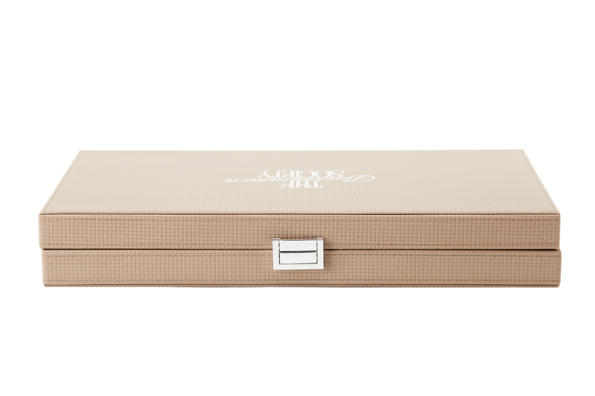 The Backgammon Society Board in beige, closed, cut out on a transparent background