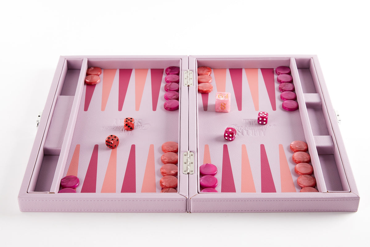 Pink backgammon board open flat, seen from above