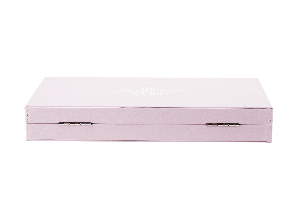 The Backgammon Society Board in blush pink, open, cut out on a transparent background